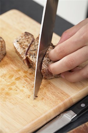 Person Cutting Ahi Tuna Steak Stock Photo - Premium Royalty-Free, Code: 600-01295988