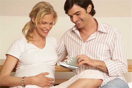 pregnant husband - Expectant Couple at Home Stock Photo - Premium Royalty-Free, Code: 600-01296083