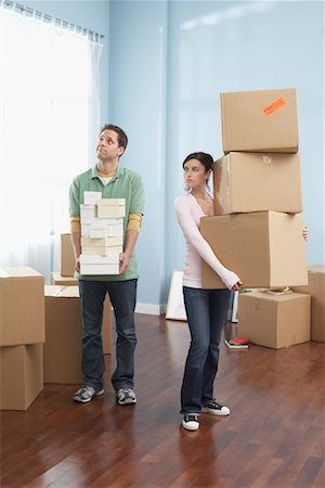 simsearch:693-03474515,k - Couple Moving into New Home Stock Photo - Premium Royalty-Free, Code: 600-01345117