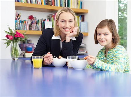 drinking milk with mom - Mother and Daughter Stock Photo - Premium Royalty-Free, Code: 600-01374077