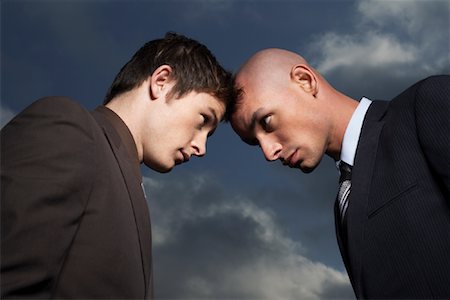 Businessmen Butting Heads Stock Photo - Premium Royalty-Free, Code: 600-01374228