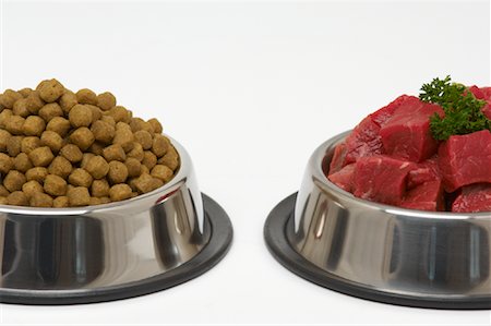 simsearch:600-03621317,k - Dog Food and Chopped Beef in Dog Bowls Stock Photo - Premium Royalty-Free, Code: 600-01374276