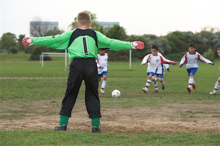 soccer team photo back - Boys Playing Soccer Stock Photo - Premium Royalty-Free, Code: 600-01374804