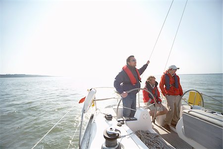 ship wheel - People on Yacht Stock Photo - Premium Royalty-Free, Code: 600-01378708