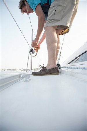 sommersport - Man Working on Yacht Photographie de stock - Premium Libres de Droits, Code: 600-01378726