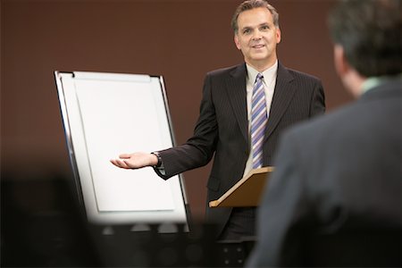 suit hands up back - Businessmen at Meeting Stock Photo - Premium Royalty-Free, Code: 600-01407335