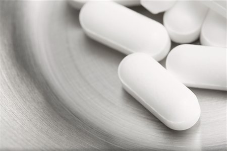 rimedio contro il dolore - White Pills Fotografie stock - Premium Royalty-Free, Codice: 600-01429232