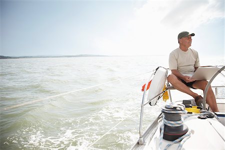 Man Sailing Stockbilder - Premium RF Lizenzfrei, Bildnummer: 600-01464337