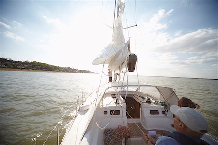 sail (fabric for transmitting wind) - People Sailing Foto de stock - Sin royalties Premium, Código: 600-01464344