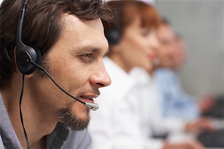 services information technology - Business People Working at Computers with Headsets Stock Photo - Premium Royalty-Free, Code: 600-01464417