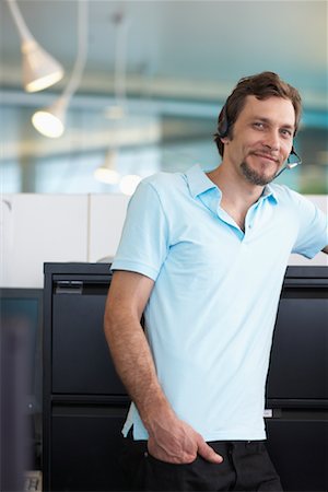 Businessman Wearing Headset Stock Photo - Premium Royalty-Free, Code: 600-01464459