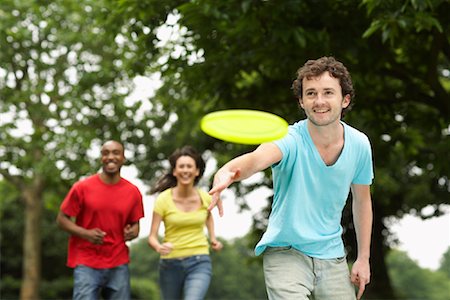 people flying disc - People Playing Frisbee Stock Photo - Premium Royalty-Free, Code: 600-01540686