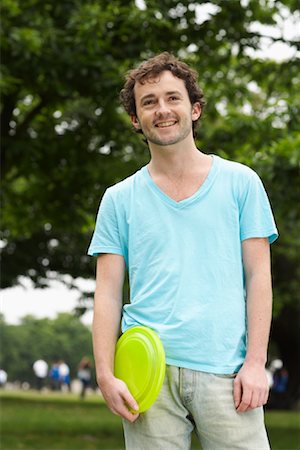 Man Holding Frisbee Stock Photo - Premium Royalty-Free, Code: 600-01540683