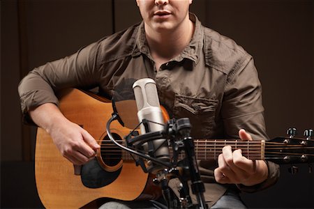 simsearch:600-01540791,k - Man Playing Guitar in Recording Studio Stock Photo - Premium Royalty-Free, Code: 600-01540820