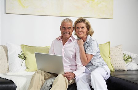 Couple Using Laptop Stock Photo - Premium Royalty-Free, Code: 600-01575631