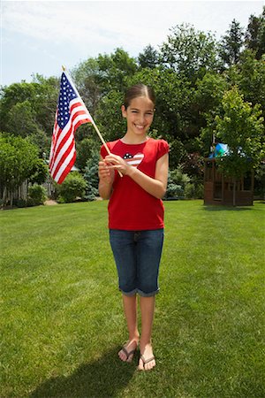 Portrait of Girl with American Flag Stock Photo - Premium Royalty-Free, Code: 600-01571881
