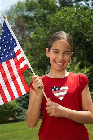 Portrait of Girl with American Flag Stock Photo - Premium Royalty-Free, Code: 600-01571882