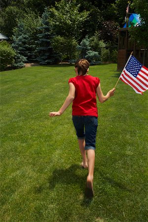 Portrait of Girl with American Flag Stock Photo - Premium Royalty-Free, Code: 600-01571883