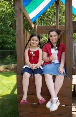 roasting marshmallows - Portrait of Girls Outdoors Stock Photo - Premium Royalty-Free, Code: 600-01571914