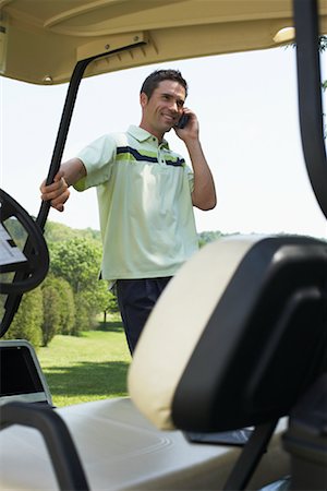 simsearch:614-06442908,k - Golfer Using Cellphone Foto de stock - Sin royalties Premium, Código: 600-01581830