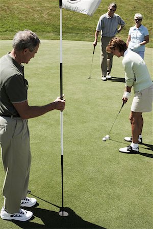 People Playing Golf Stock Photo - Premium Royalty-Free, Code: 600-01581858