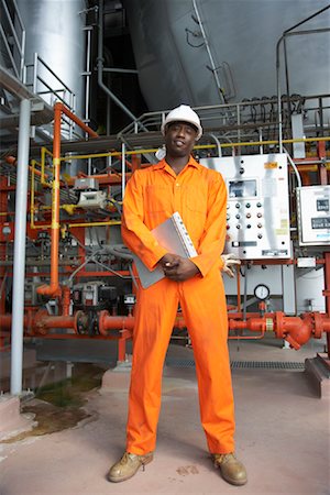 factory, african american - Worker at Water Treatment Plant Stock Photo - Premium Royalty-Free, Code: 600-01582035