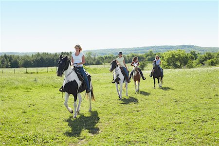 Women Horseback Riding Foto de stock - Sin royalties Premium, Código: 600-01582251