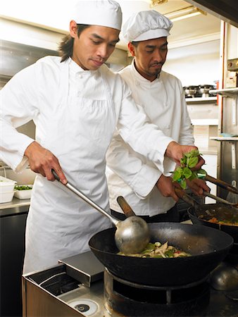 dad and late teen - Cooks Working Together Stock Photo - Premium Royalty-Free, Code: 600-01593550