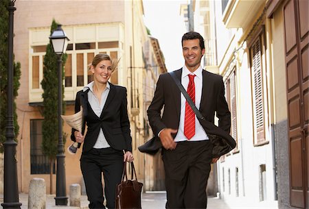 simsearch:600-01593612,k - Business People Walking Outdoors Stock Photo - Premium Royalty-Free, Code: 600-01593599