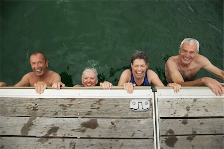 edge of lake - Couples on Edge of Dock Stock Photo - Premium Royalty-Free, Code: 600-01606108