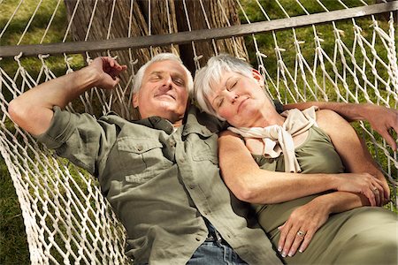 person lying in hammock - Couple in Hammock Stock Photo - Premium Royalty-Free, Code: 600-01606117