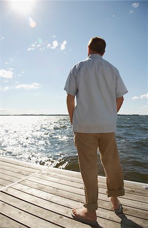 sechziger jahre - Man Standing on Dock Stockbilder - Premium RF Lizenzfrei, Bildnummer: 600-01606154