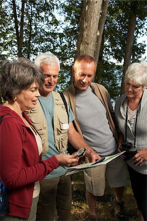side view old woman close up - Couples in Woods with Compass and Map Stock Photo - Premium Royalty-Free, Code: 600-01606164