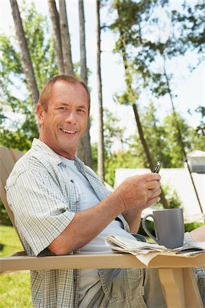 Man in Chair Stock Photo - Premium Royalty-Free, Code: 600-01606194