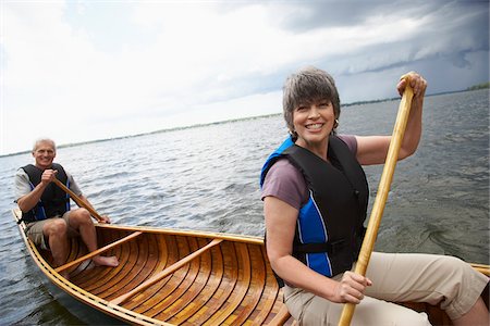 picture of old lady smiling - Couple in Canoe Stock Photo - Premium Royalty-Free, Code: 600-01606208