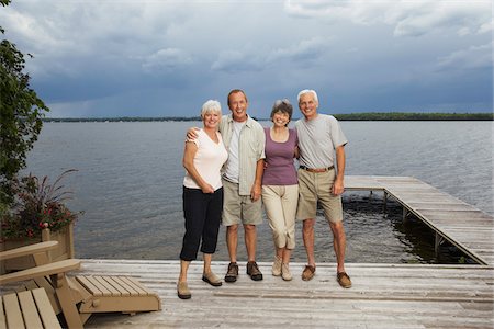 senior woman friends - Couples on Dock by Lake Stock Photo - Premium Royalty-Free, Code: 600-01606203