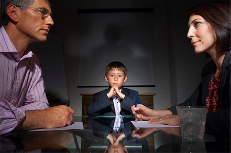 family group serious - Boy in Business Meeting Stock Photo - Premium Royalty-Free, Code: 600-01606435