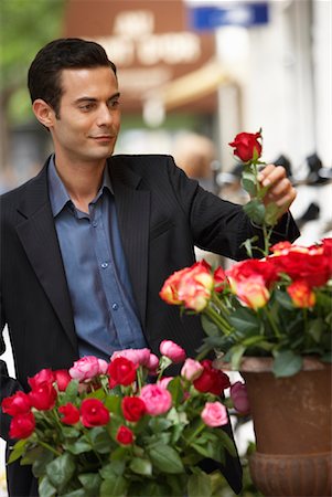 storefronts with flowers - Man Shopping at Flower Store Stock Photo - Premium Royalty-Free, Code: 600-01606525