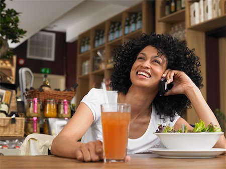 Woman in Cafe Stock Photo - Premium Royalty-Free, Code: 600-01606718