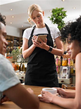 restaurant hostess - Couple and Waitress in Cafe Stock Photo - Premium Royalty-Free, Code: 600-01606724