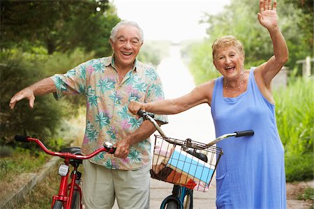 people wave hello - Couple With Bicycles Stock Photo - Premium Royalty-Free, Code: 600-01606789