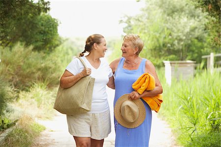 senior woman friends - Women Walking On Path Stock Photo - Premium Royalty-Free, Code: 600-01606798