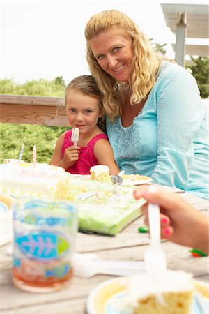 Mother and Daughter at Birthday Party Stock Photo - Premium Royalty-Free, Code: 600-01614173