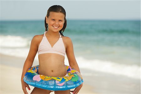 portrait of little girl swimsuit - Girl on Beach Stock Photo - Premium Royalty-Free, Code: 600-01614207