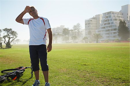 Man Taking a Break from Biking Stock Photo - Premium Royalty-Free, Code: 600-01614568