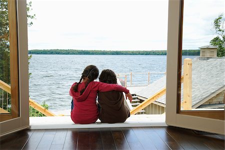 sister hugging together - Portrait of Brother and Sister Stock Photo - Premium Royalty-Free, Code: 600-01614714