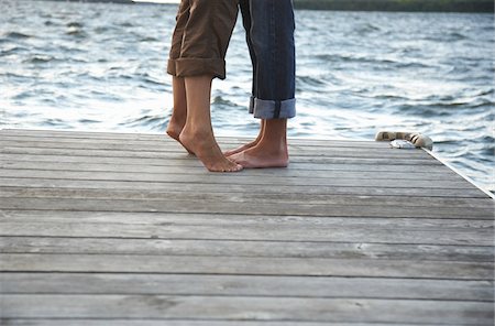 Close-Up of Couple on Dock Stock Photo - Premium Royalty-Free, Code: 600-01614819