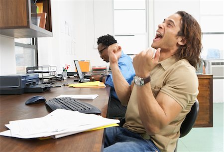 frustrated person at workplace - Portrait of excited man Stock Photo - Premium Royalty-Free, Code: 600-01614883