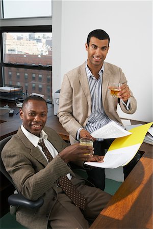 pictures of black male accountants - Businessmen Toasting Stock Photo - Premium Royalty-Free, Code: 600-01615005