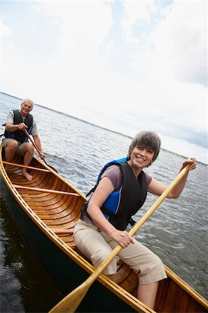 Couple Canoeing Stock Photo - Premium Royalty-Free, Code: 600-01615221